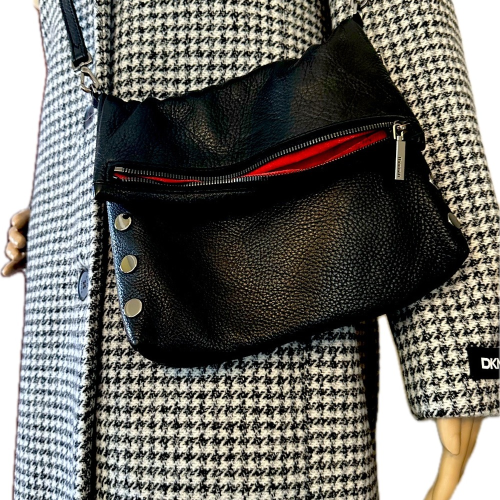Hammitt small leather clutch with strap.